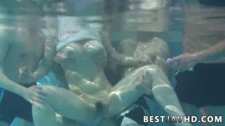 Hot Asian girl enjoys wild trio action with two guys!