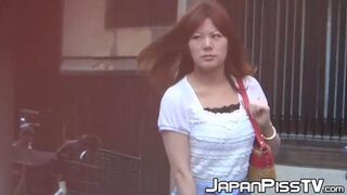 Japanese woman seeks private🤫 spot for public relief